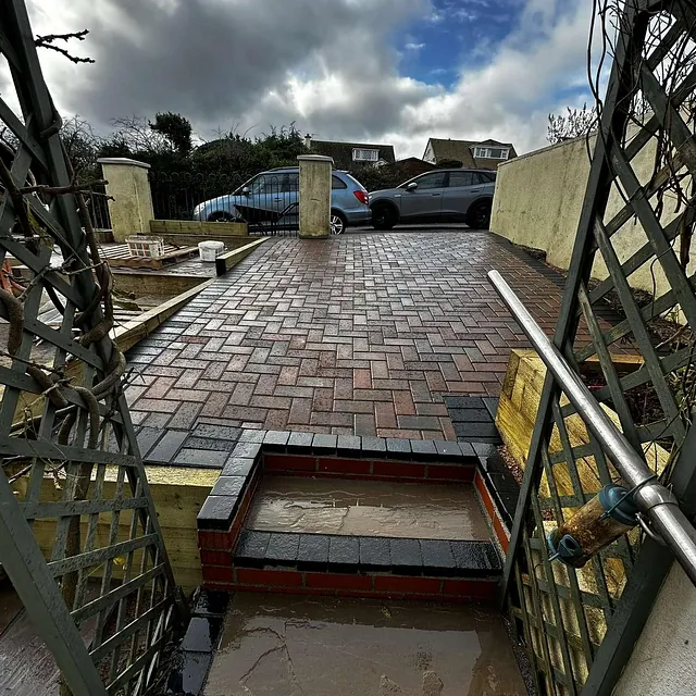 Block paved driveway and steps